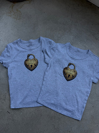 IF FOUND PLEASE RETURN TEE